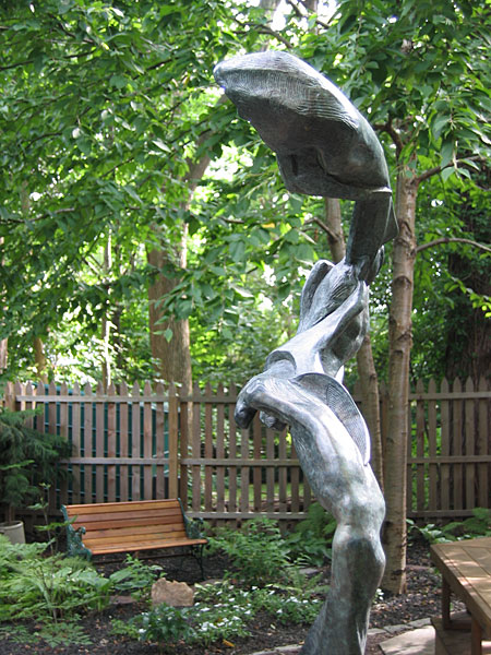 Bird In Hand, a 2004 bronze sculpture by James Peniston.