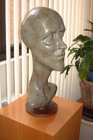 Louis' Head, a 1999 bronze sculpture by James Peniston. Private collection, New York City