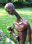 Family Discovering Nature, a 2005 bronze sculpture by James Peniston. Private collection, St. Louis, Missouri